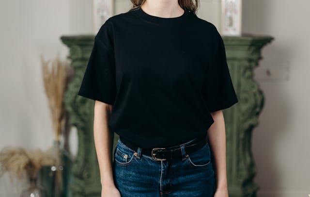 Person in Black Crew Neck T-shirt and Blue Denim Jeans